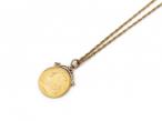 Antique Sovereign coin pendant on a spiga link chain in 9kt yellow gold