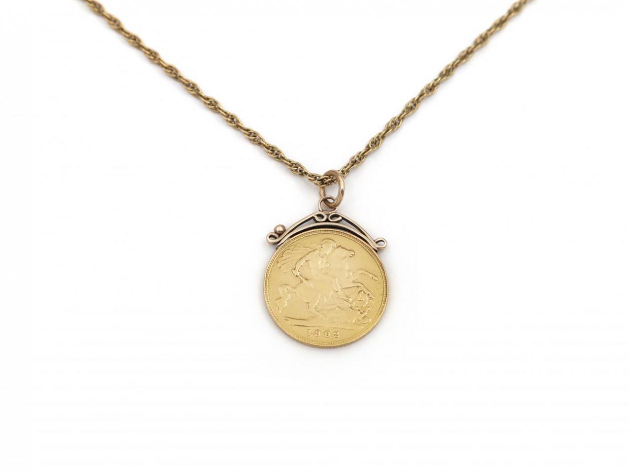 Antique Sovereign coin pendant on a spiga link chain in 9kt yellow gold