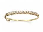 Vintage diamond set carved hinged bangle in 18kt yellow gold