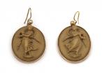 Antique oval lava cameo drop earrings in yellow gold