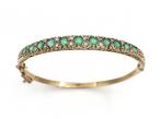 Vintage emerald and diamond hinged bangle in 9kt yellow gold