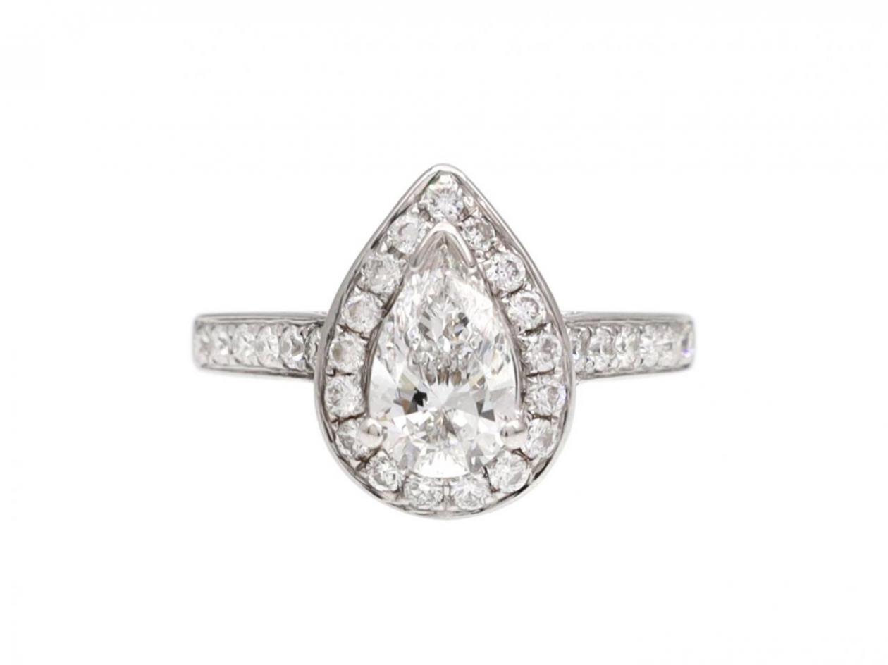 Diamond pear shape halo cluster engagement ring in 18kt white gold