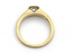 Bezel set diamond solitaire engagement ring in yellow gold
