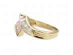 Retro diamond baguette crossover ring in yellow gold