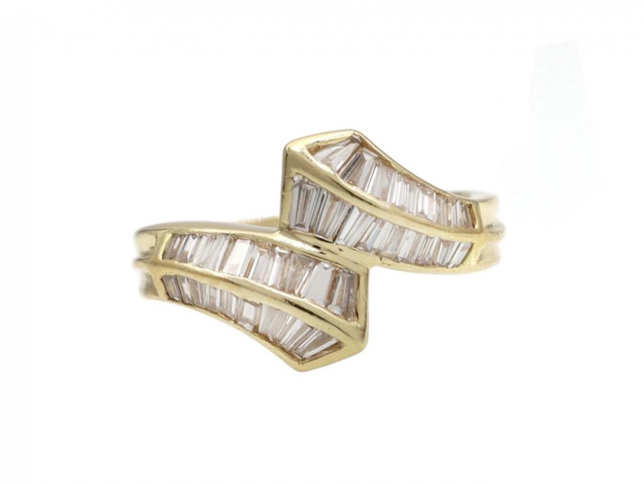 Retro diamond baguette crossover ring in yellow gold