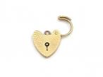 1968 engine turned heart lock in 9kt yellow gold