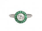 Art Deco style diamond and emerald target ring in platinum