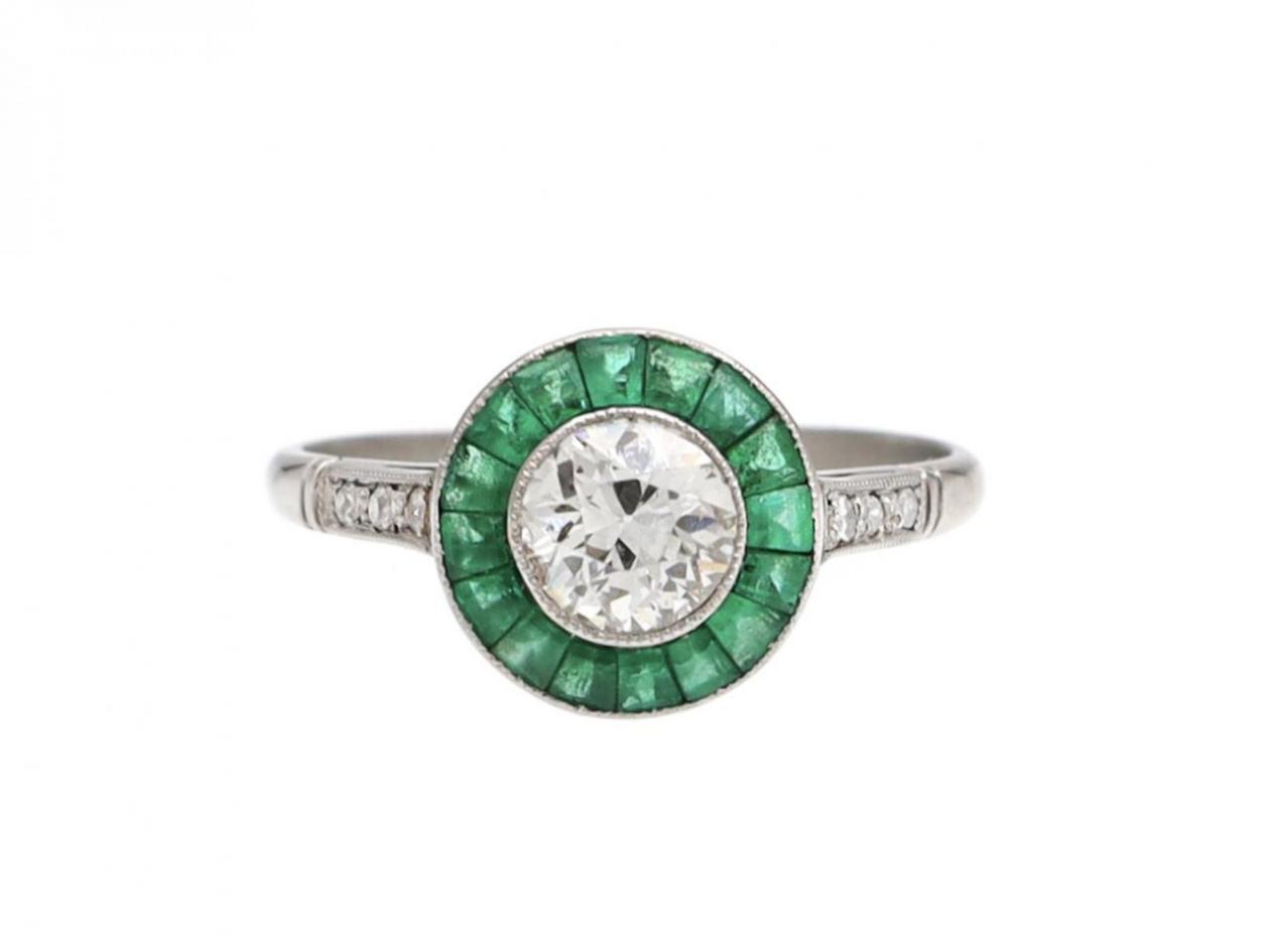 Art Deco style diamond and emerald target ring in platinum