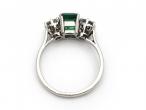 Colombian emerald and diamond three stone ring in platinum