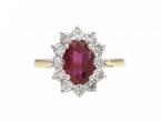 Contemporary oval ruby and diamond coronet cluster ring