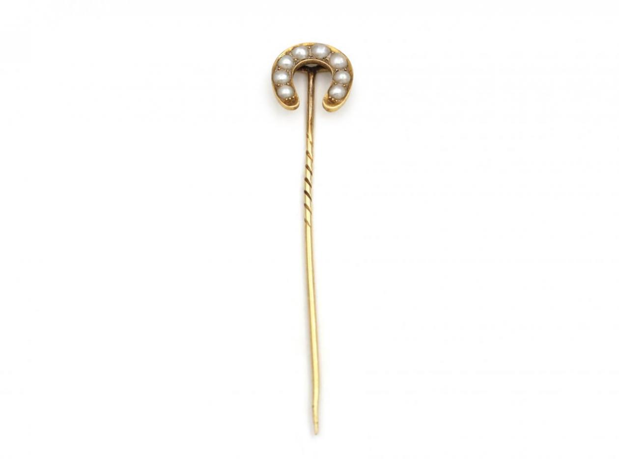 Antique natural pearl horseshoe stickpin in yellow gold