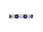 Diamond and sapphire half eternity ring in 18kt yellow gold