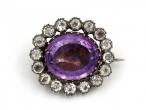 Antique amethyst and paste oval cluster brooch
