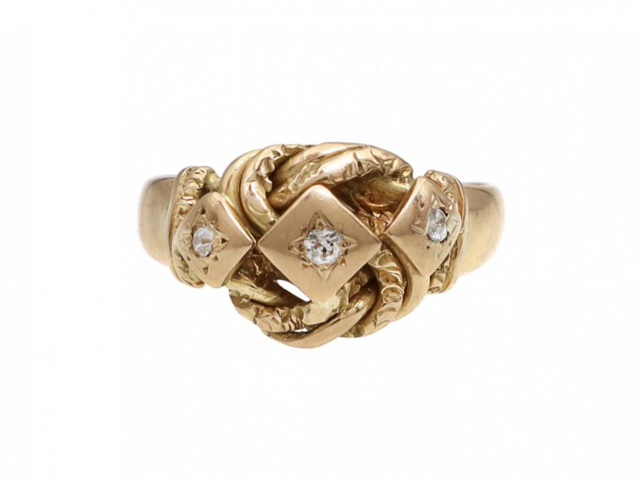 Antique diamond three stone knot ring in 18kt gold