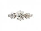 Edwardian cushion shape diamond three stone engagement ring