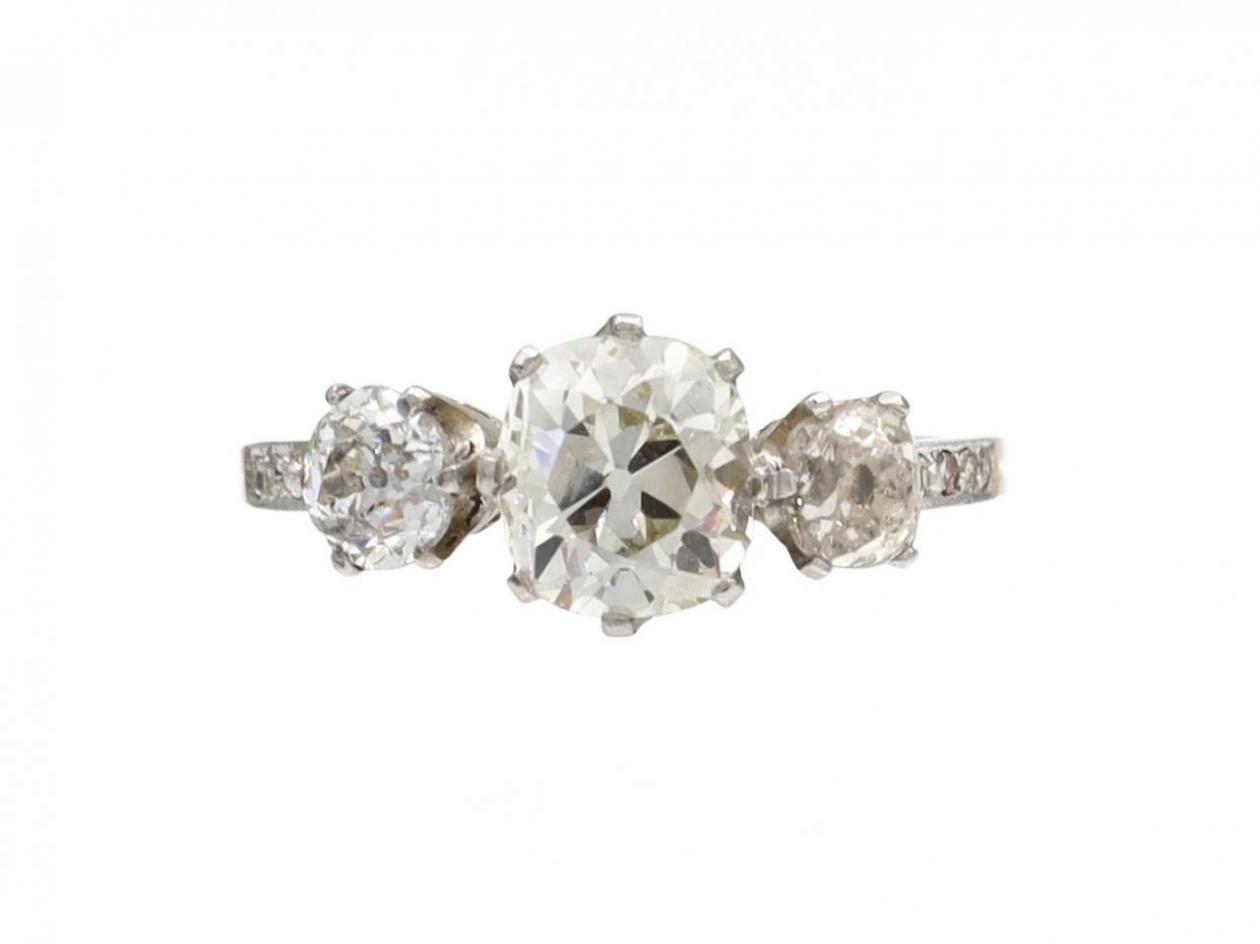 Edwardian cushion shape diamond three stone engagement ring
