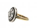 Antique circular diamond cluster ring in platinum and 18kt yellow gold