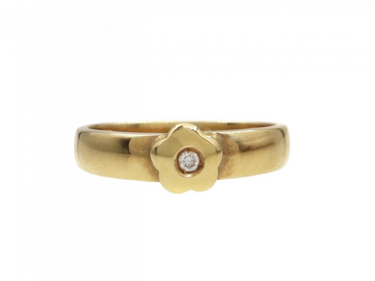 Contemporary 18kt yellow gold diamond set flower ring
