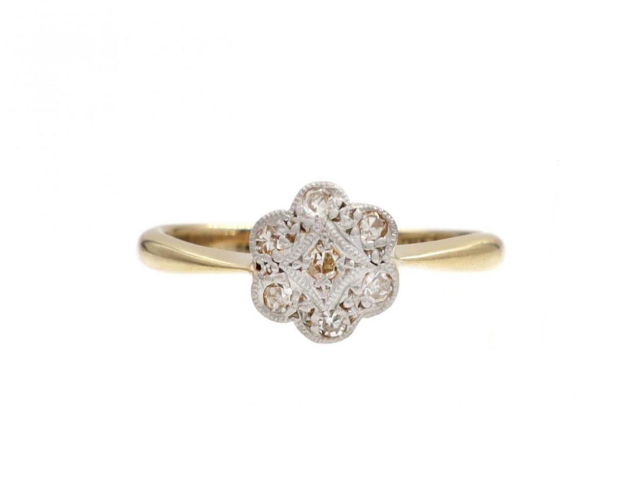 Edwardian diamond set daisy cluster ring in platinum and 18kt gold