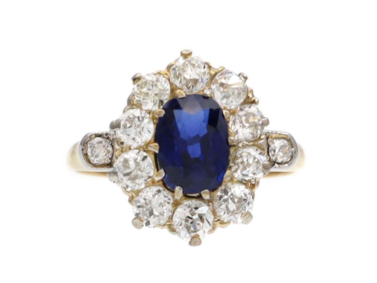 Antique sapphire and diamond oval cluster ring in gold