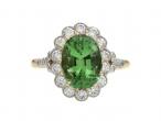 Vintage green tourmaline and diamond floral cluster ring
