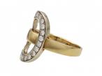 Modernist diamond open oval ring in 18kt yellow gold