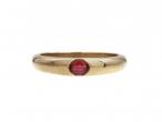 Modern 9kt yellow gold and oval ruby stacking ring