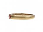 Modern 9kt yellow gold and oval ruby stacking ring