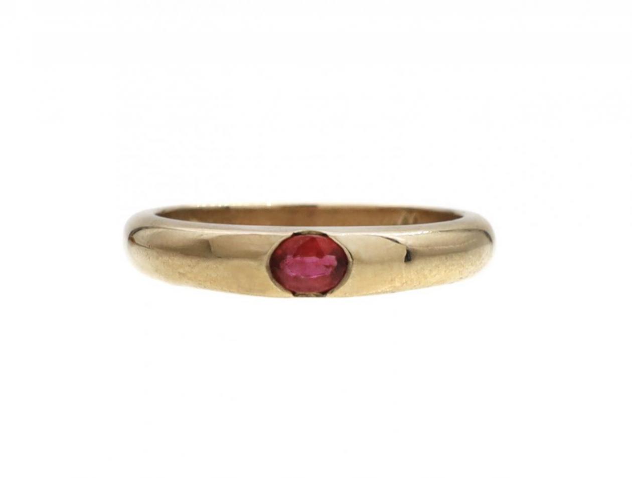 Modern 9kt yellow gold and oval ruby stacking ring