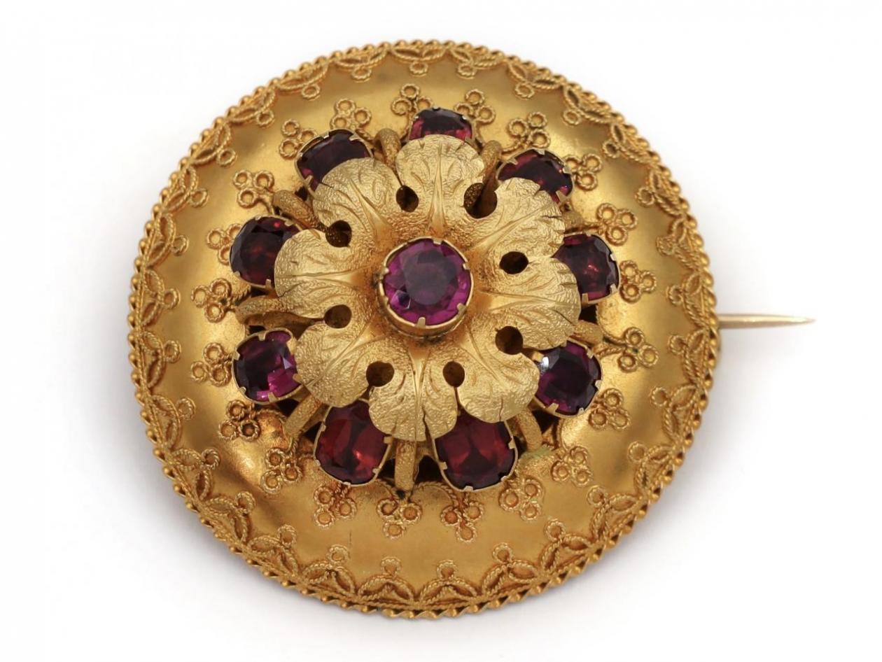 Antique Etruscan revival garnet set flower brooch in 18kt gold