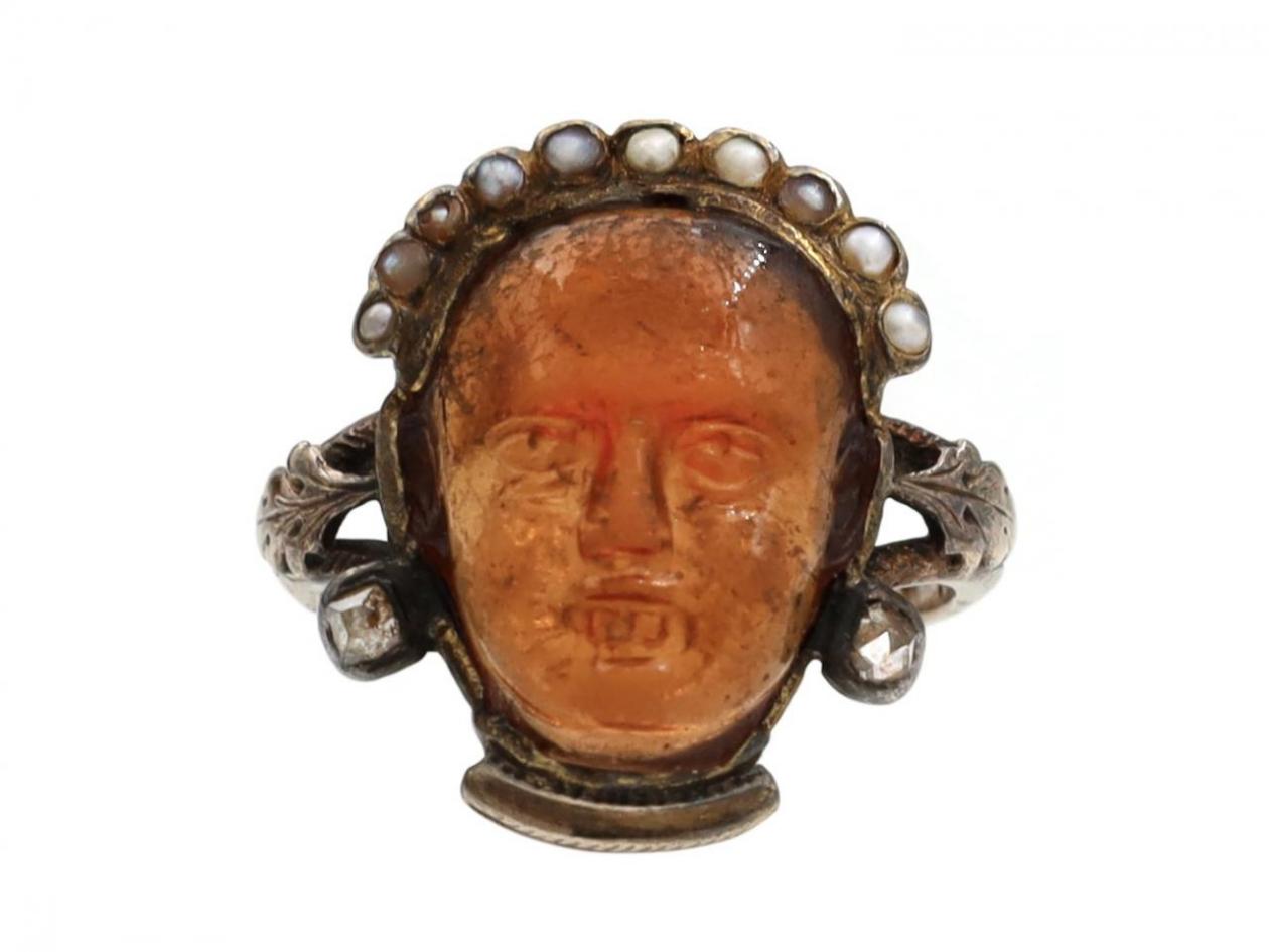 Antique carved hessonite garnet, seed pearl and diamond face ring