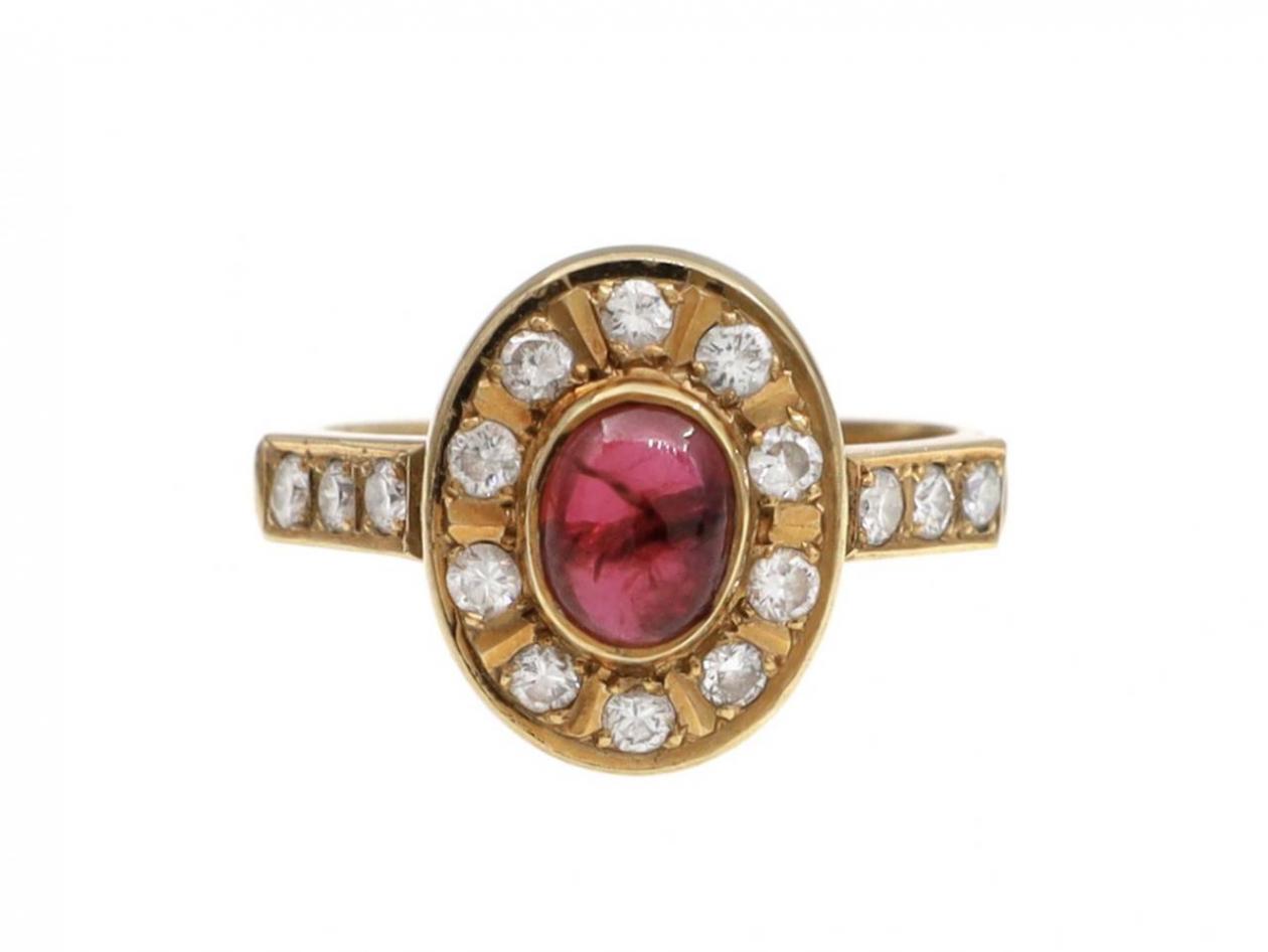 Vintage cabochon ruby and diamond oval cluster ring in gold