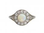 Art Deco opal and diamond circular cluster ring in platinum and gold