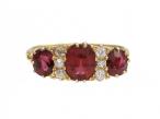 Victorian ruby and diamond three stone carved ring in 18kt yellow gold