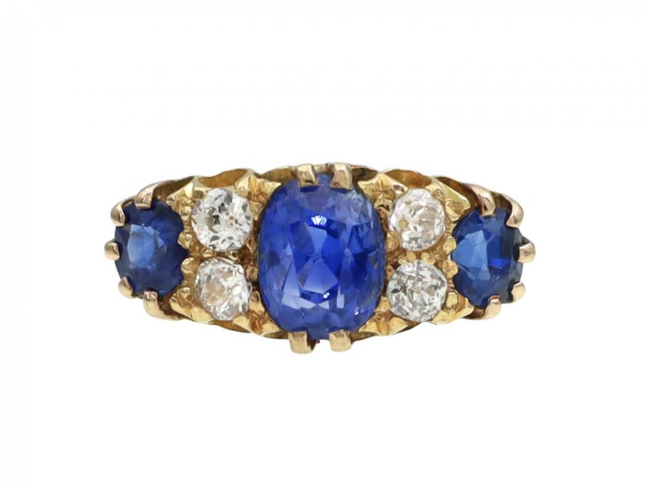 Antique Ceylon sapphire and diamond three stone ring in 18kt gold