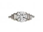 Art Deco 1.25ct diamond solitaire ring with step shoulders