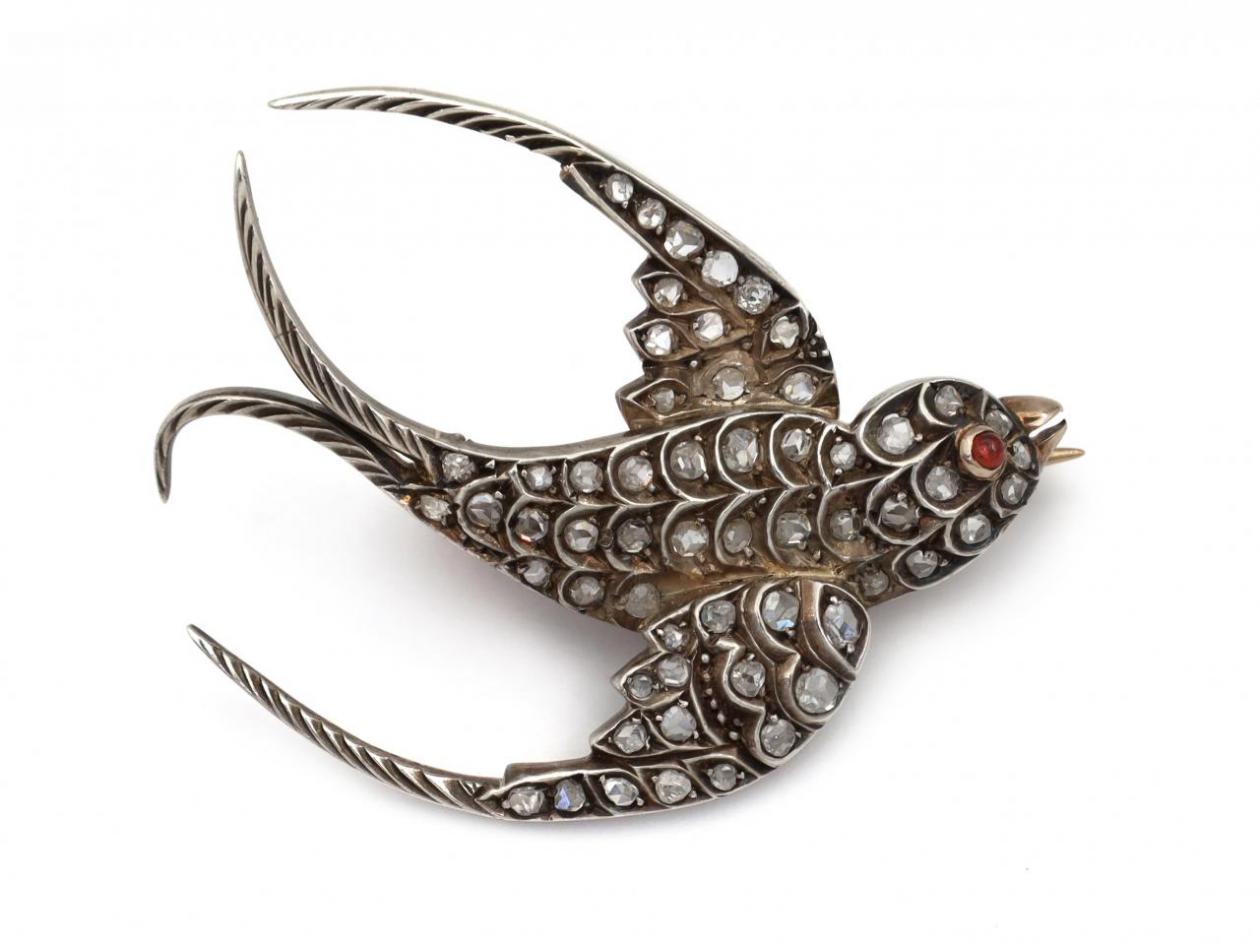 Antique rose cut diamond swallow bird brooch in silver on gold