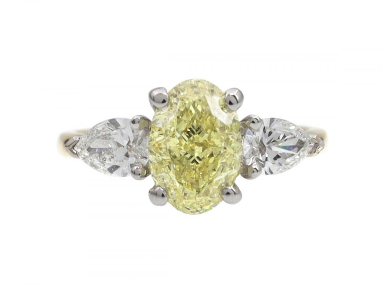 Brilliant Cut Oval Yellow Diamond & Diamond Three Stone Engagement Ring in 18kt Gold