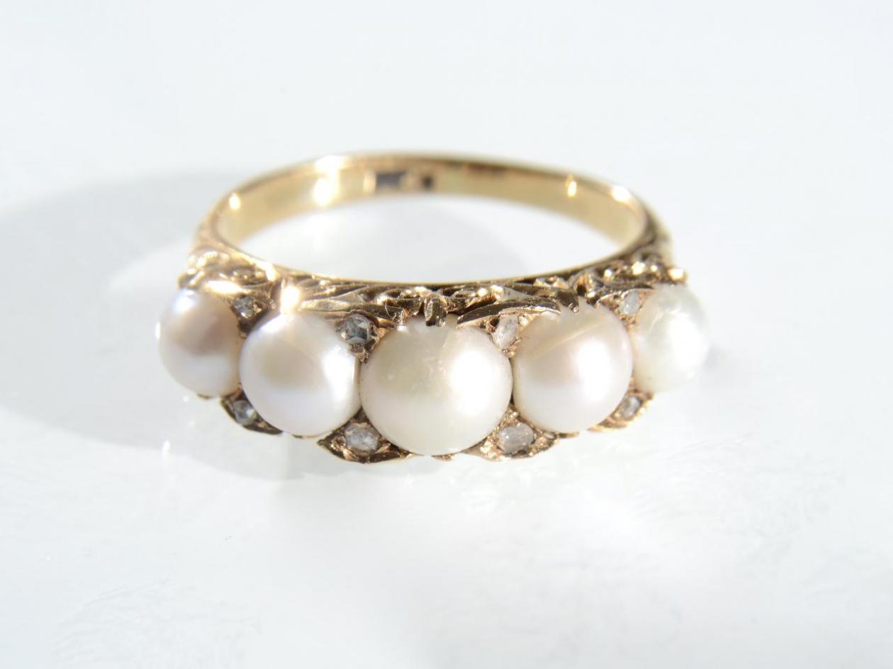 Victorian five stone pearl and diamond carved ring