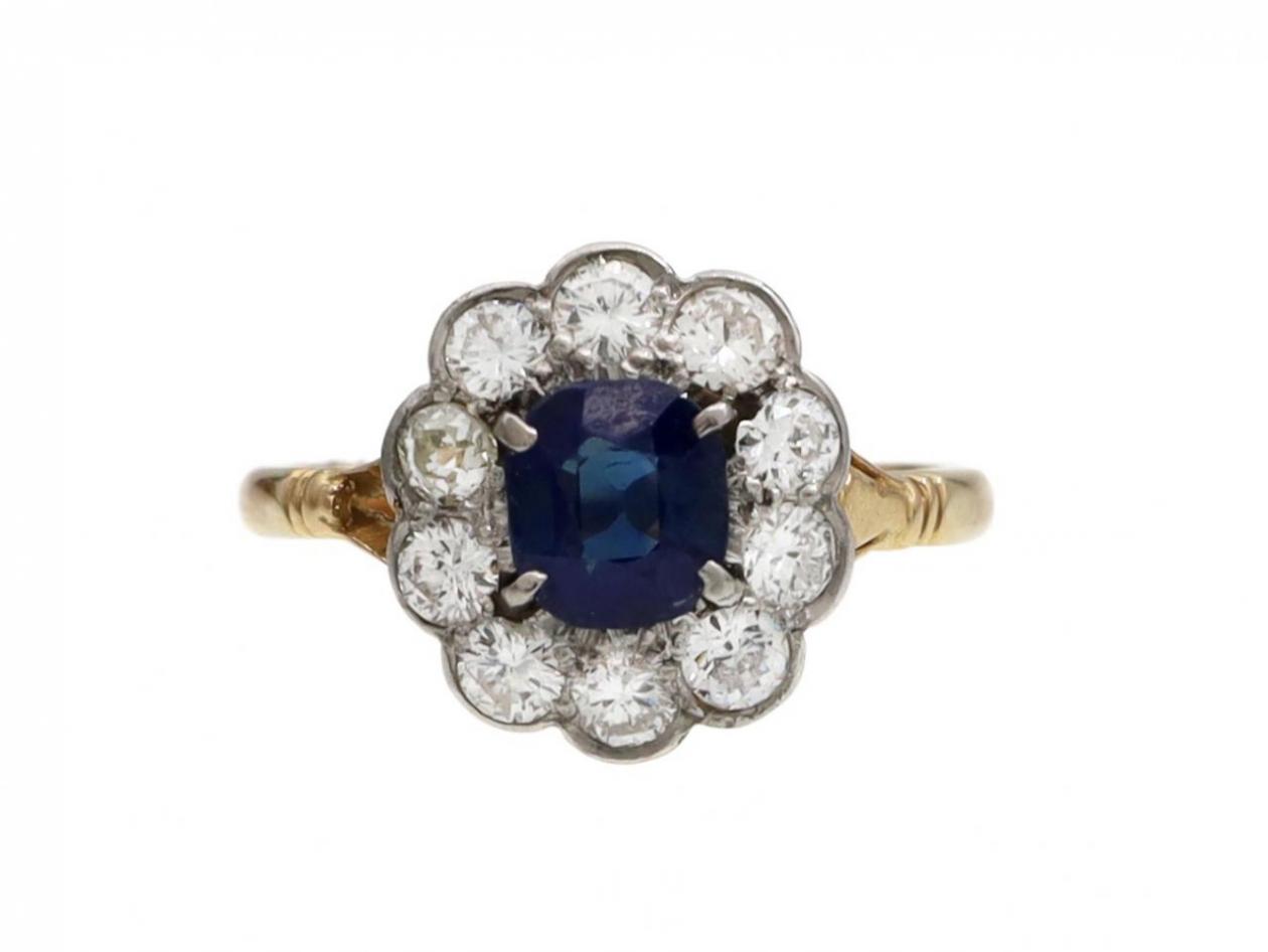 Antique sapphire and diamond floral cluster engagement ring