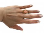 1970s angel skin coral oval dress ring in 18kt yellow gold