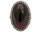 Antique large cabochon oval garnet and rose cut diamond cluster ring