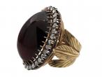 Antique large cabochon oval garnet and rose cut diamond cluster ring