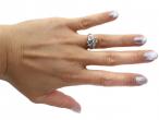 Art Deco Rectangular Step Cut Diamond Three Stone Twist Ring in Platinum