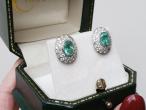 Vintage oval emerald and diamond cluster earrings