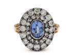 Victorian oval sapphire and diamond ring in silver on gold