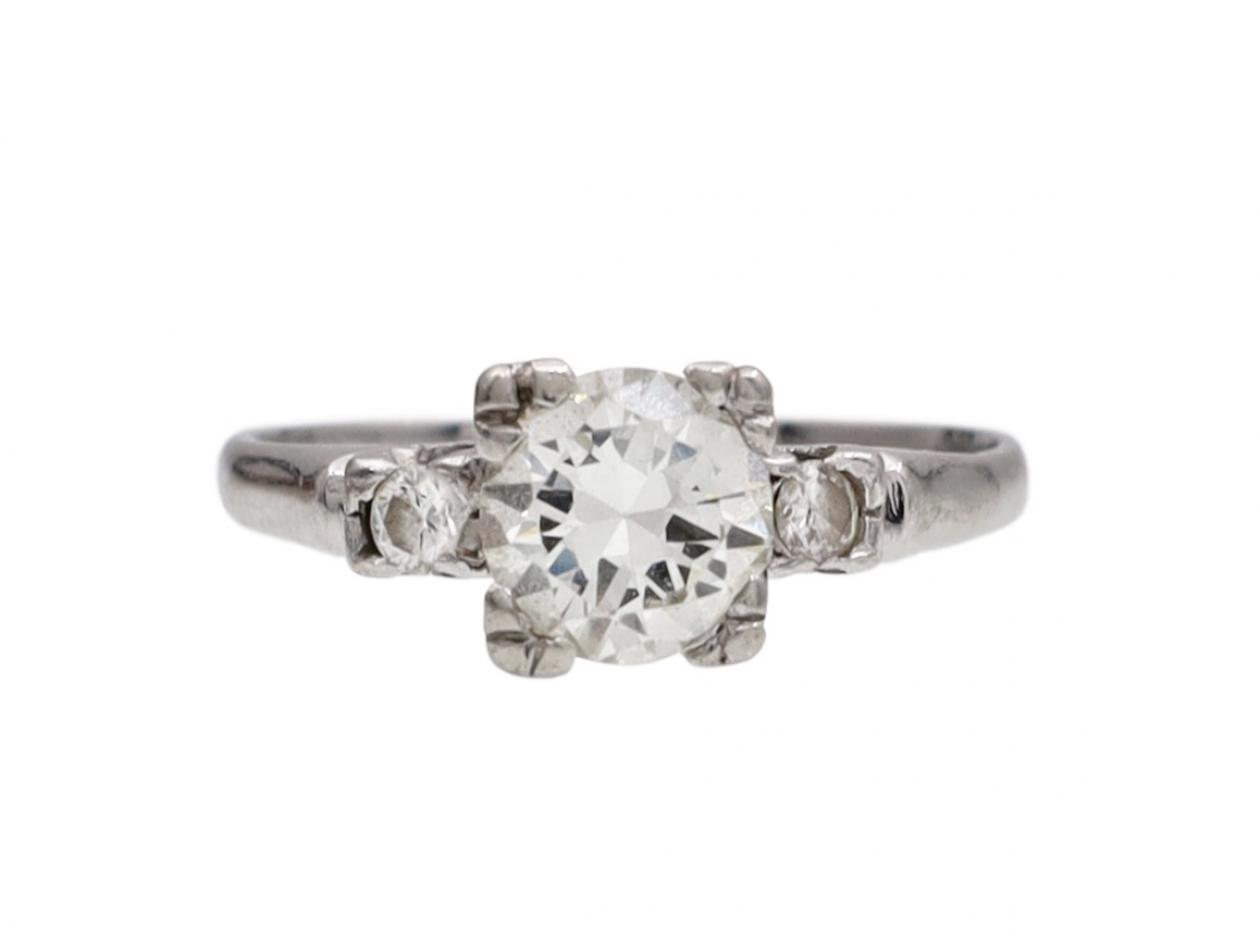 Vintage flanked diamond solitaire engagement ring in platinum