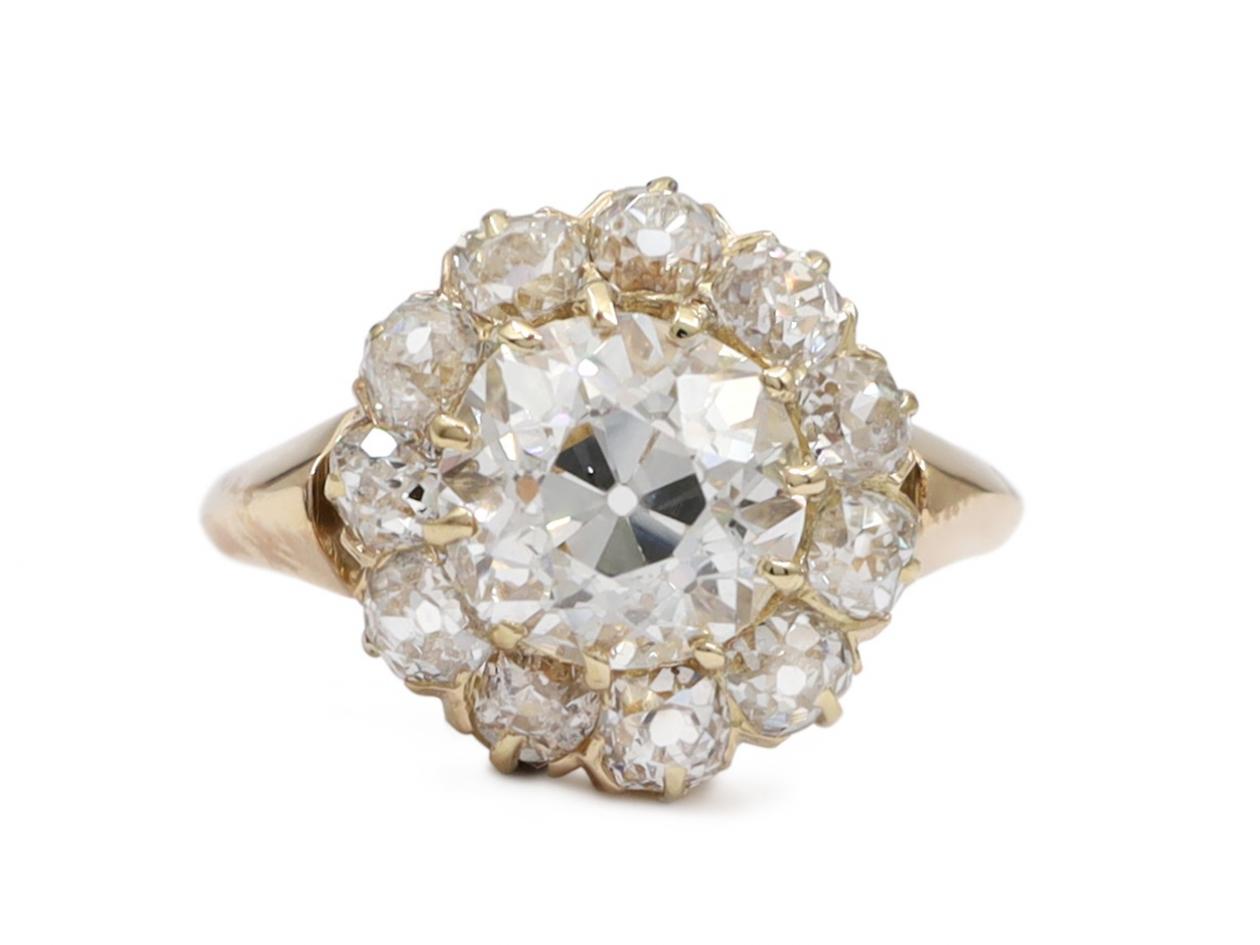 Antique 1.70ct Old Mine cut diamond centre coronet cluster ring