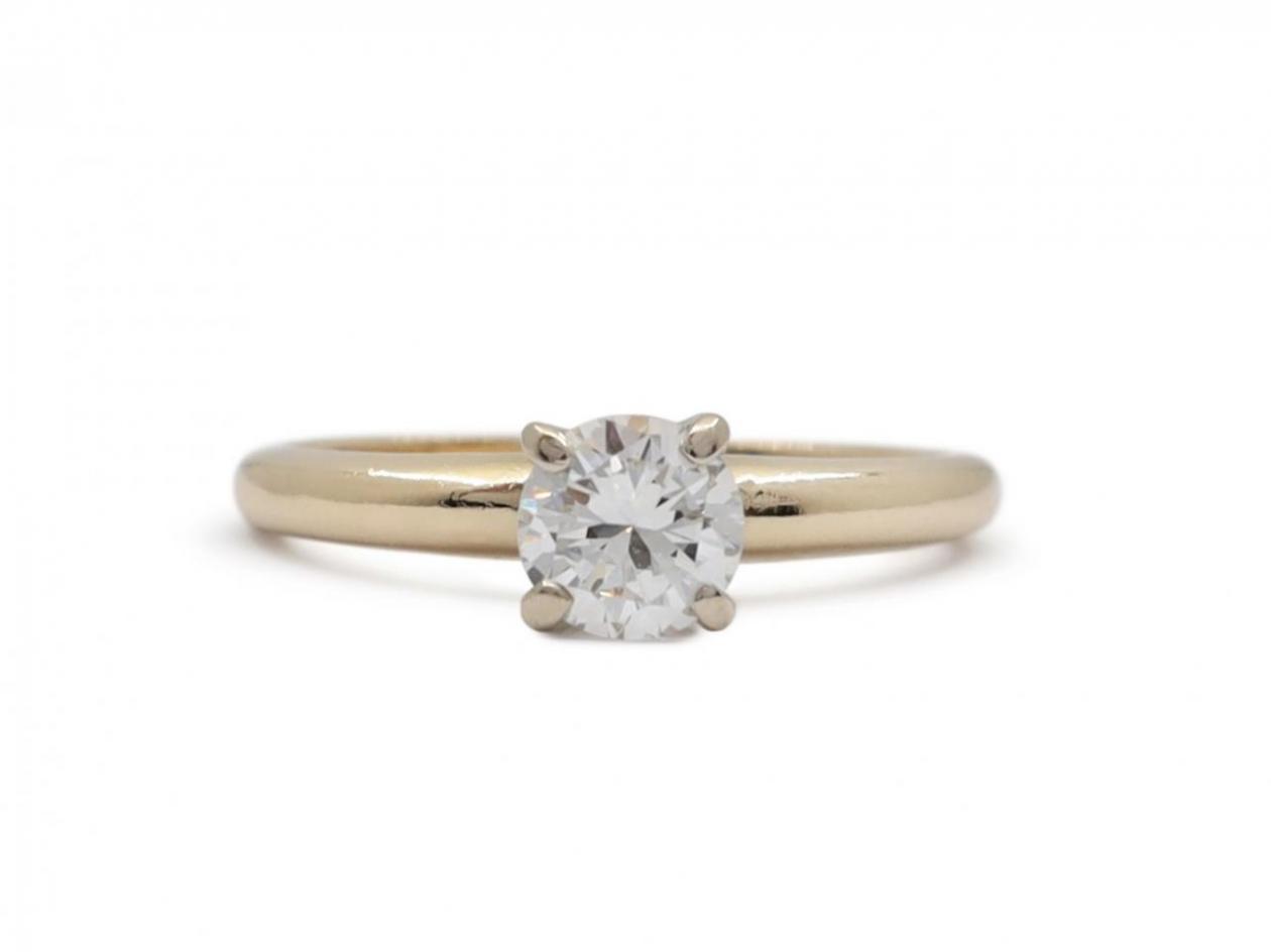 Vintage 0.50ct round diamond solitaire engagement ring in gold
