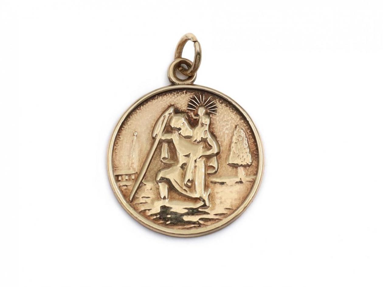 Vintage 1990 circular St. Christopher pendant in 9kt yellow gold